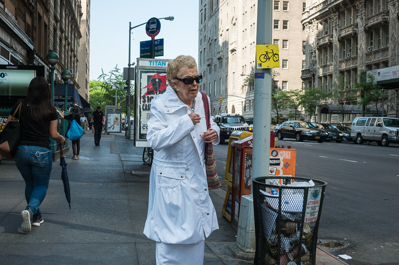 Woman in white at 7th Ave & W 57th St.