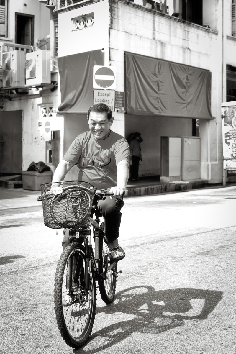 Riding bicycle in Little India, Singapore