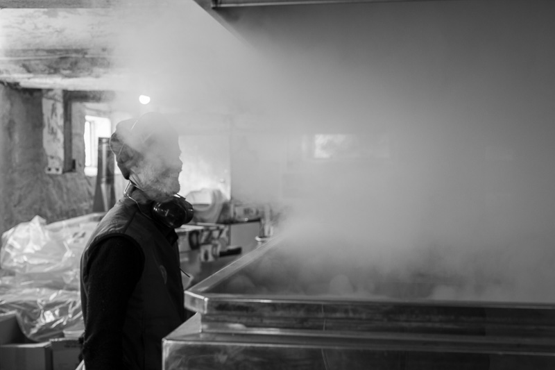 As the evaporators heats up, steam rises from the surface.