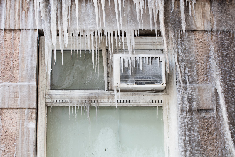 Air conditioner covered in ice