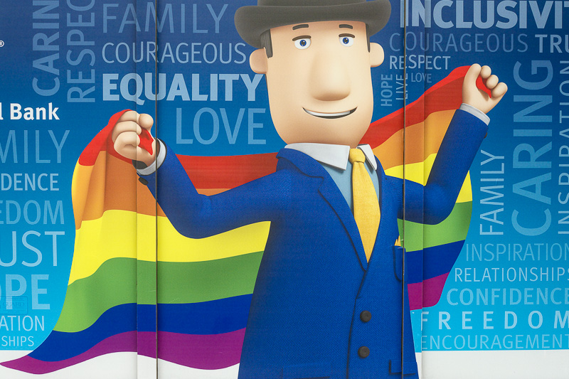 BMO's blue-suited bowler hat guy with rainbow flag