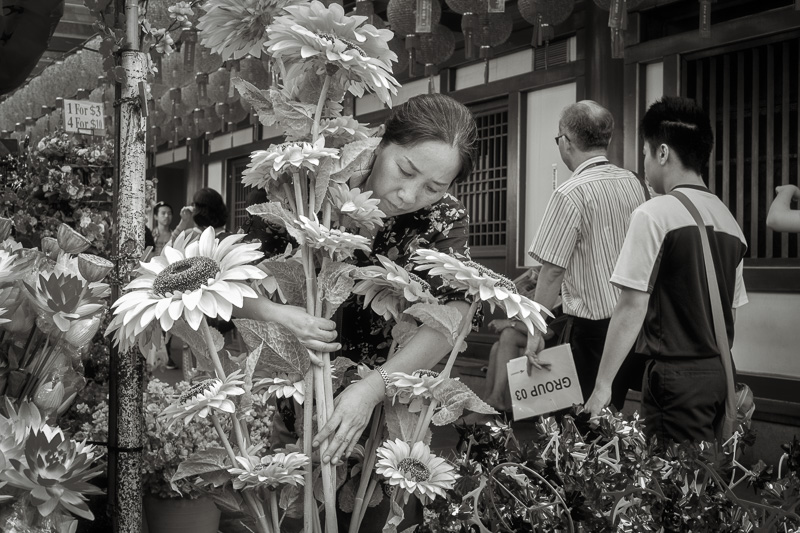 Arranging flowers in Chinatown, Singapore