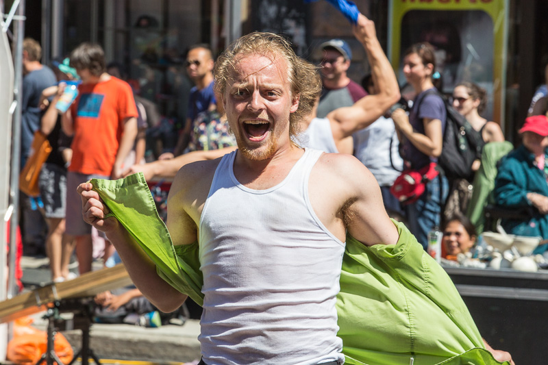 Man pulling off shirt