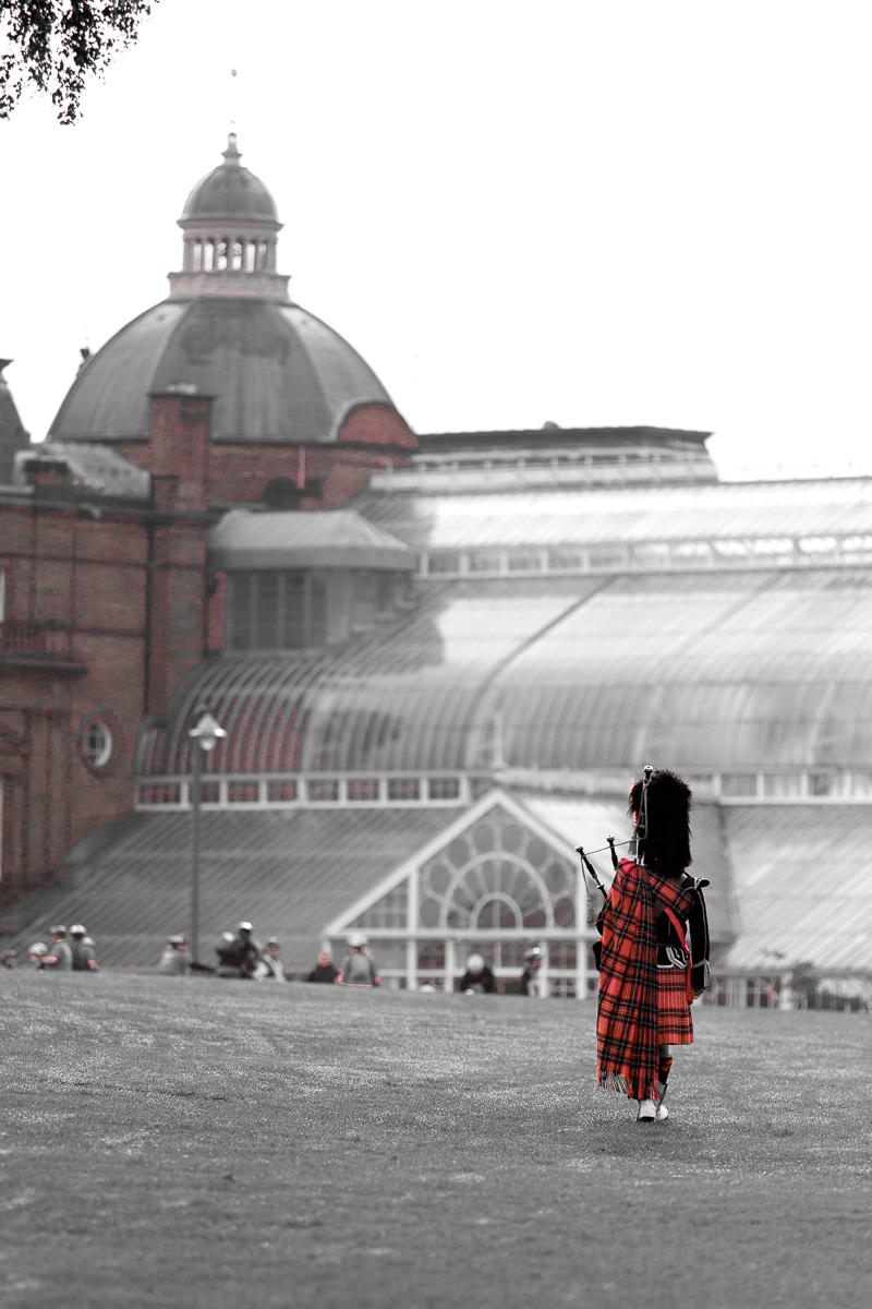 Piper walking thru Glasgow Green to the People's Palace