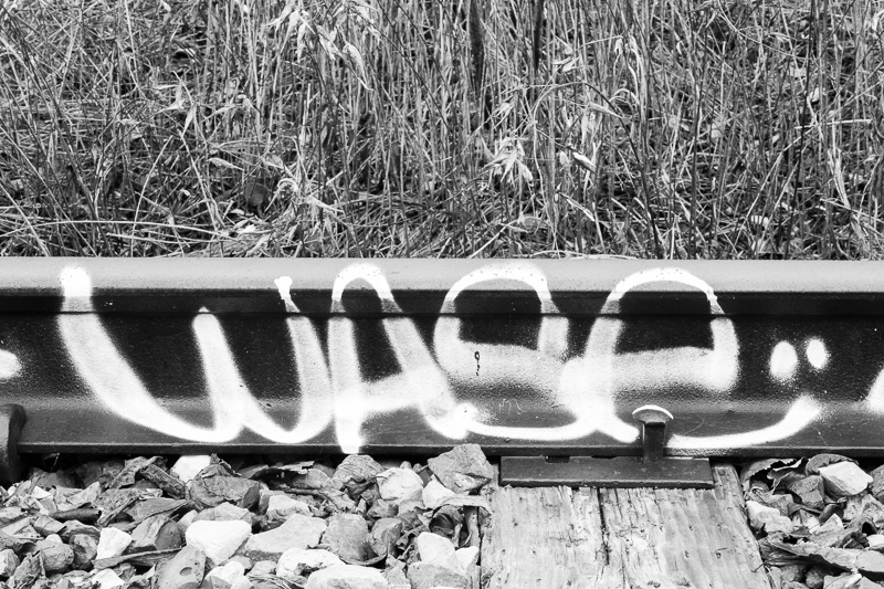 Wase - graffiti on railway tracks