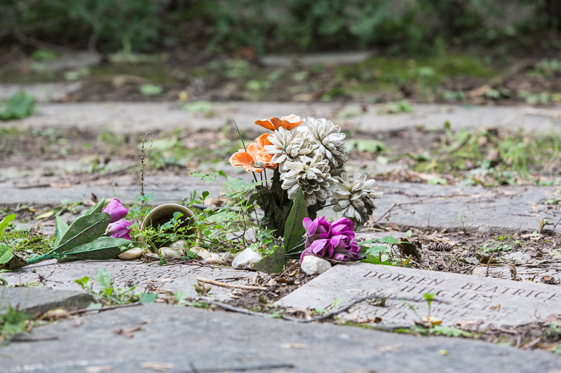 Plastic flowers at a grave site