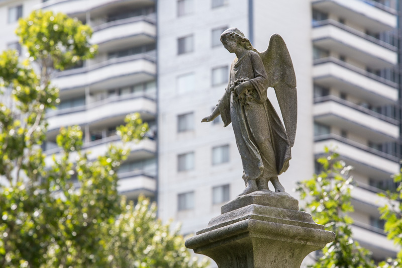 Angel and apartment building