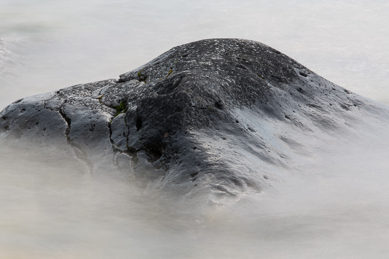 Water washing over rock