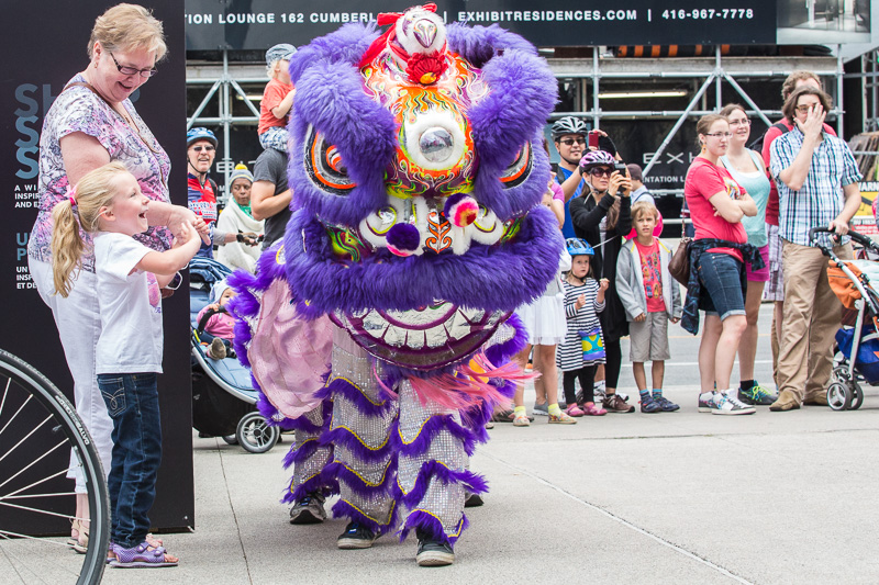 Child Reacts to the Lion Dance in front of the ROM