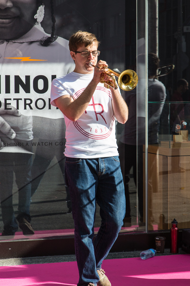 Playing Trumpet in front of Holt Refrew