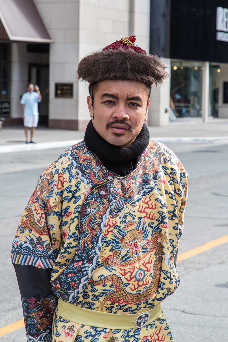 Wearing traditional costume in front of the ROM