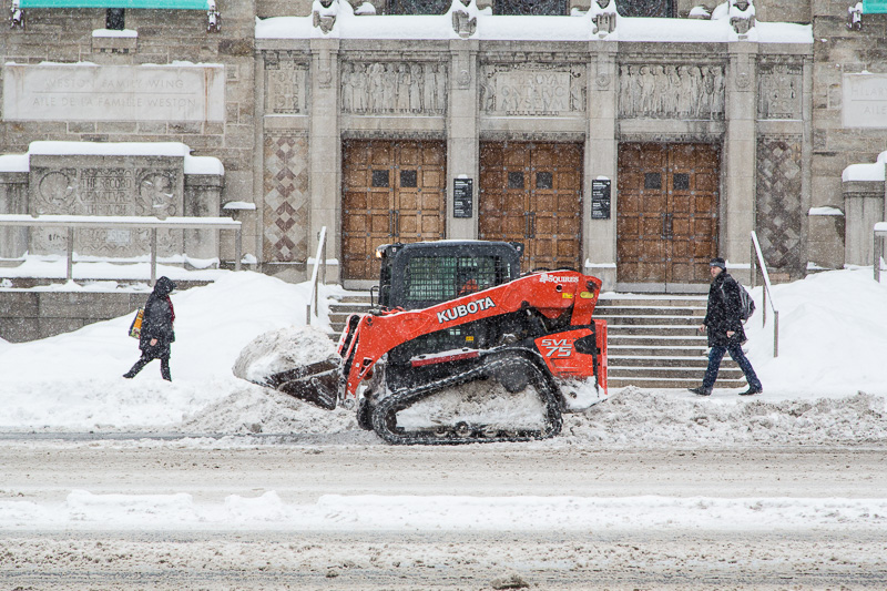 Clearing snow from the ROM's old entrance on Queen's Park.