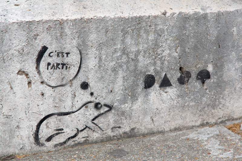 Stencil on the steps up to Sacre Coeur, Paris