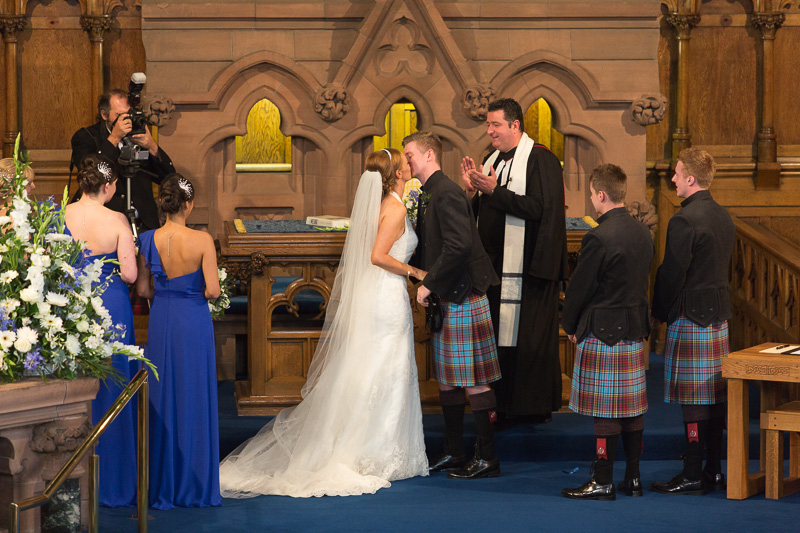 Sealing the vows with a kiss