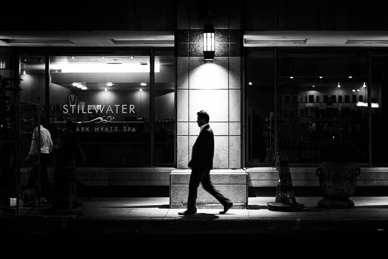 Silhouette of man walking at night