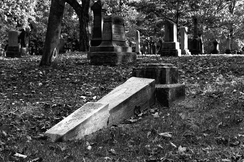 Fallen headstone in St. James Cemetery, Toronto
