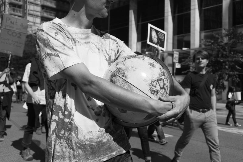 Kid holding a globe, Student Climate Strike, Bay Street, Toronto