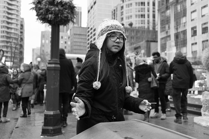 Girl wearing a toque, Cumberland Avenue, Toronto