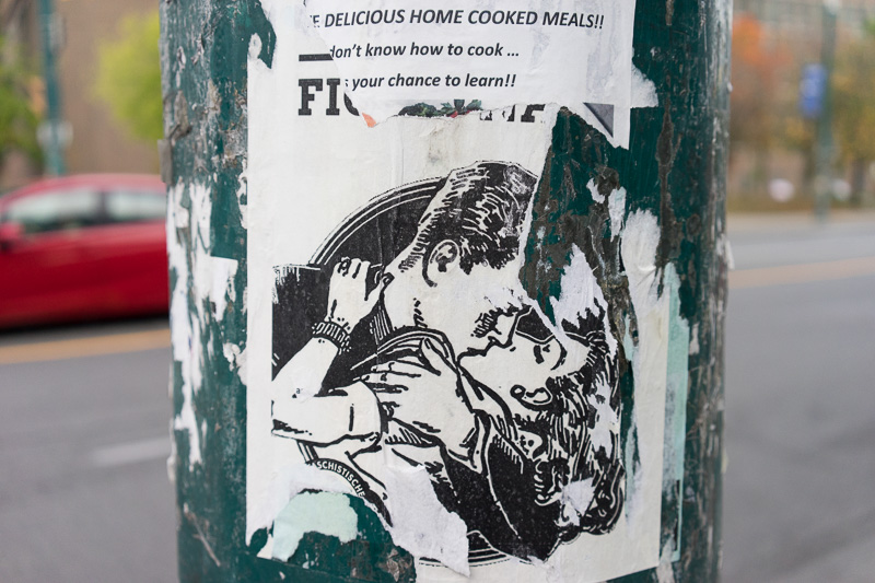Poster On Pole - kissing couple