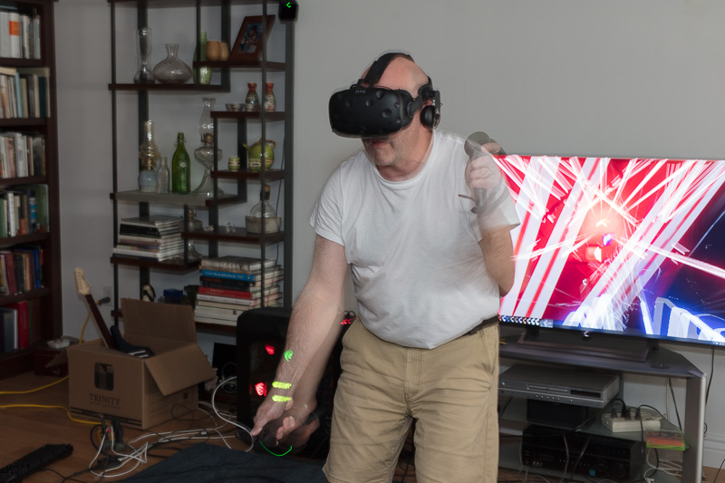 Wearing a virtual reality headset.
