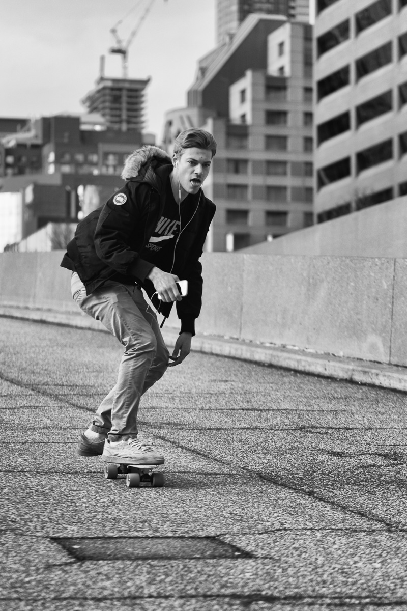 A skateboarder in Nathan Phillips Square, Toronto