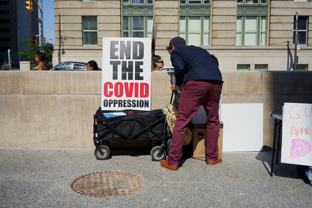 End The Covid Oppression - an anti-vaxxer's sign at Union Station, Toronto.