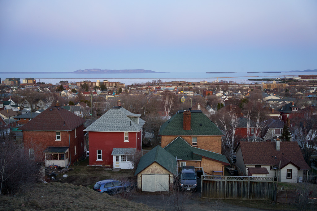 An evening view of Thunder Bay with the Sleeping Giant in the background.